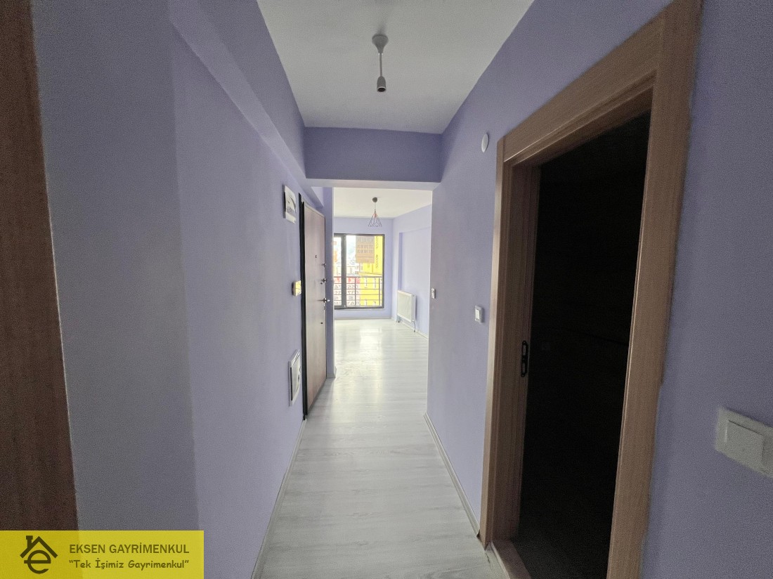 ERDEMİR CADDESİ ÜZERİNDE SIFIR AYARINDA KİRALIK  1+1DAİRE