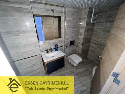 ERDEMİR CADDESİ ÜZERİNDE SIFIR AYARINDA KİRALIK  1+1DAİRE